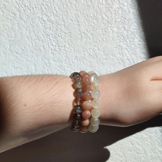 Bracelet en pierre de lune noire, orange et blanche en 8mm